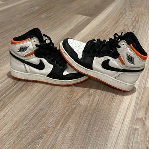 Nike air Jordan black, white and orange size 6.5Y size 8 women’s